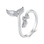 A sterling silver mermaid tail ring with clear gemstones, shown on a white background.