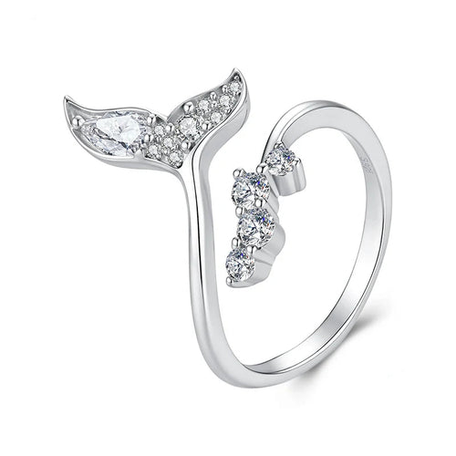 A sterling silver mermaid tail ring with clear gemstones, shown on a white background.