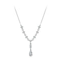 A sterling silver Y-necklace with clear cubic zirconia stones, featuring a delicate chain, star-shaped links, and a teardrop pendant.