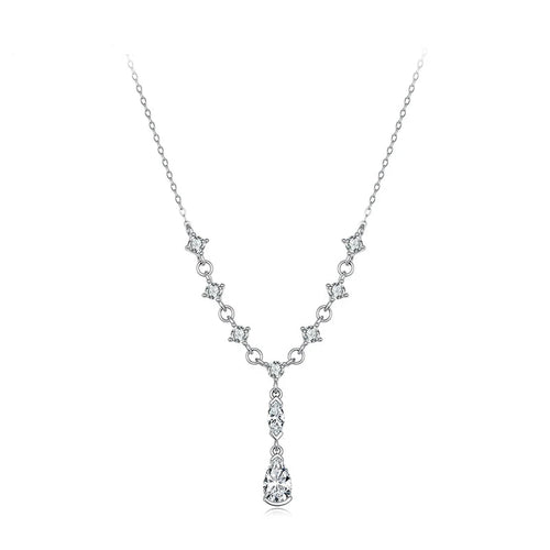 A sterling silver Y-necklace with clear cubic zirconia stones, featuring a delicate chain, star-shaped links, and a teardrop pendant.