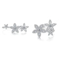 A pair of silver-toned flower cluster rings shown on a white background, labeled 'Open' and 'Close' to demonstrate the setting. The rings are paved with small clear stones.