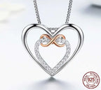 Entwined Hearts: Sterling Silver Infinity Necklace With Double Hearts Necklaces