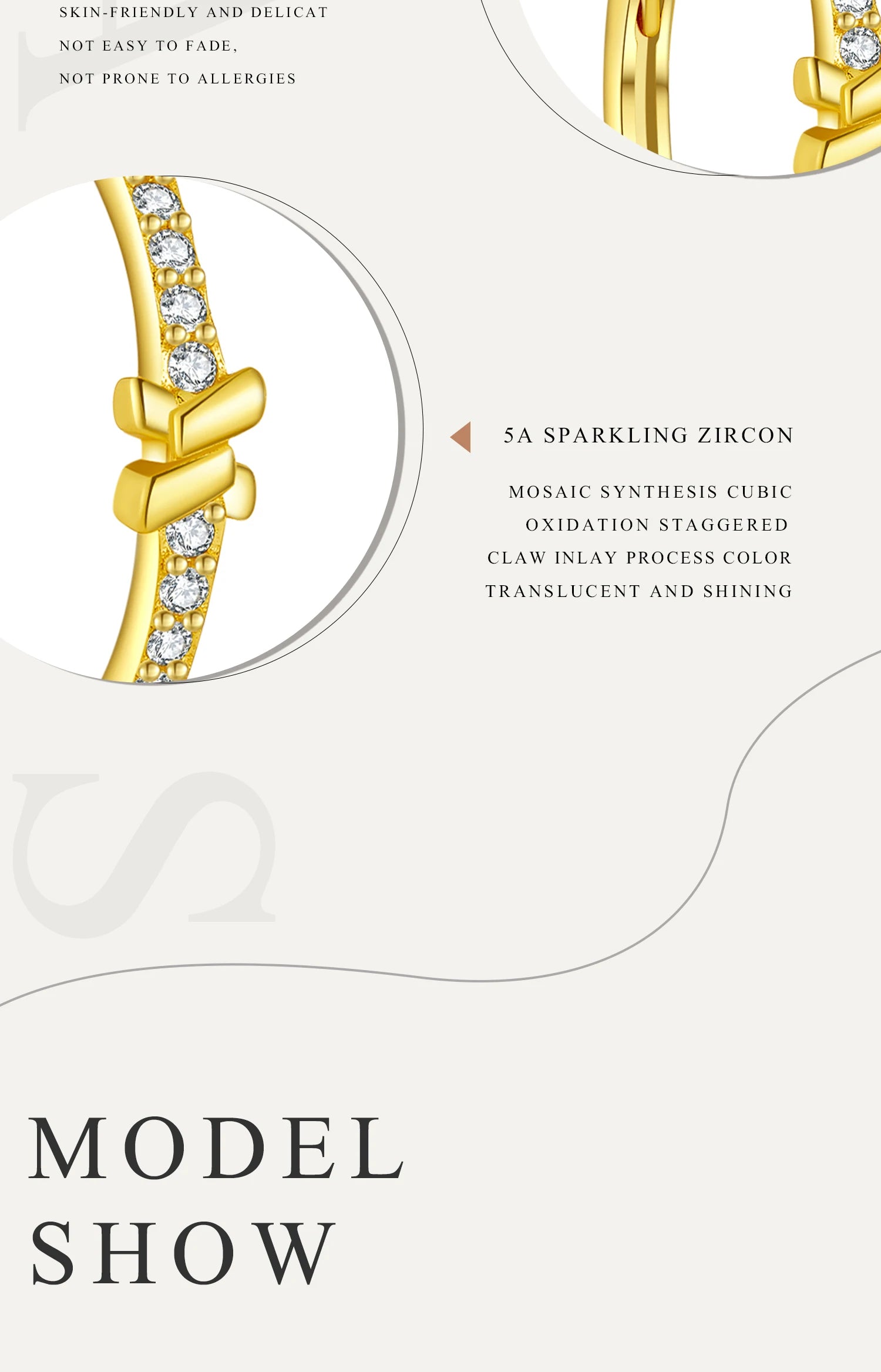 Gold earring with zircon stones on a white background