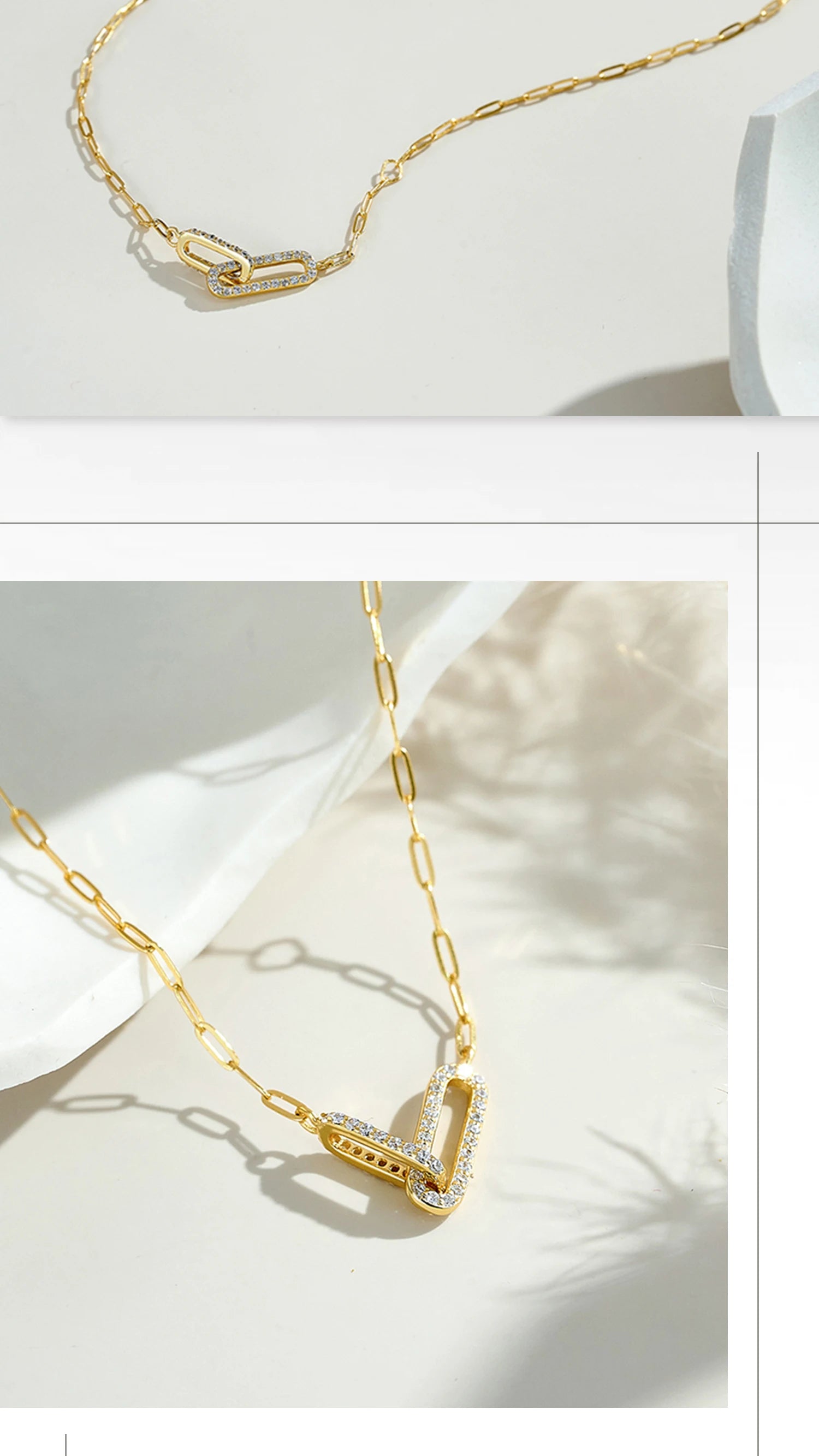 Gold necklace with a geometric pendant on a white background