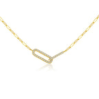 Gold necklace with a rectangular pendant on a white background
