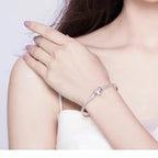 Entwined With Love: Sterling Silver Infinity Heart Bracelet Bracelets