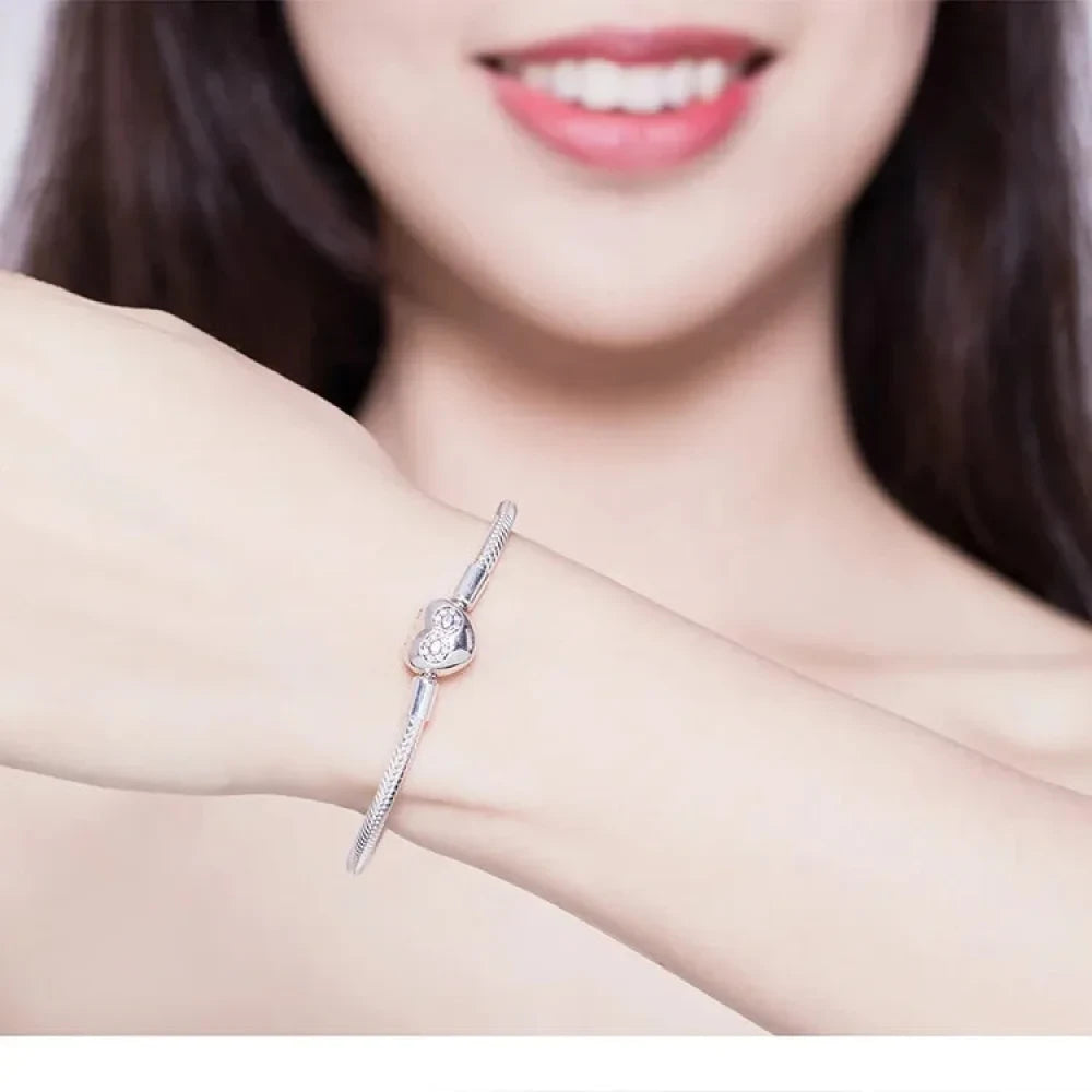 Entwined with Love: Sterling Silver Infinity Heart Bracelet - Bracelets