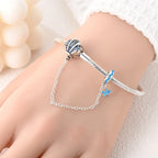 Coastal Sterling Silver Charm Bracelet With Sparkling Seashell Bracelets
