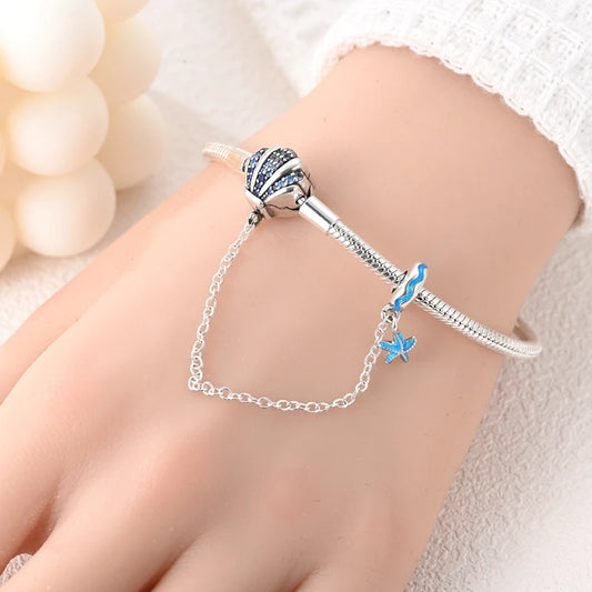 Coastal Sterling Silver Charm Bracelet With Sparkling Seashell - Bracelets