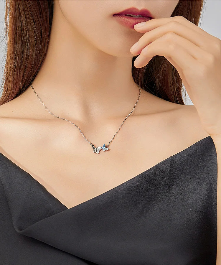 Soar with Style: Blue Zircon Korean Style Sterling Silver Butterfly Necklace - Necklaces