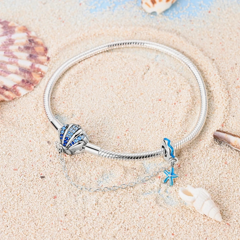 Coastal Sterling Silver Charm Bracelet With Sparkling Seashell - Bracelets
