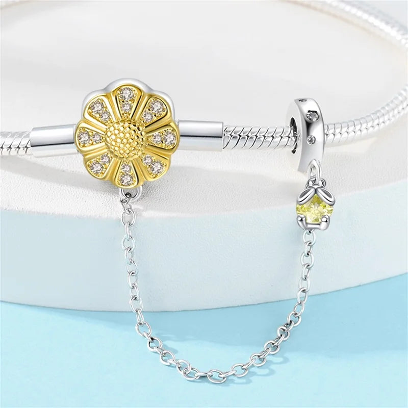 Radiant Daisy Sterling Silver Charm Bracelet With Dangling Chain - Bracelets