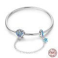 Coastal Sterling Silver Charm Bracelet With Sparkling Seashell 18 Cm Bracelets