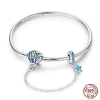 Coastal Sterling Silver Charm Bracelet With Sparkling Seashell 18 Cm Bracelets