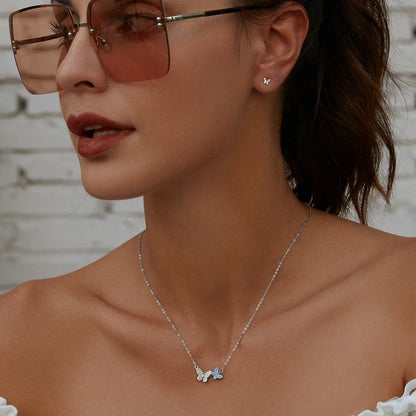 Soar with Style: Blue Zircon Korean Style Sterling Silver Butterfly Necklace - Necklaces