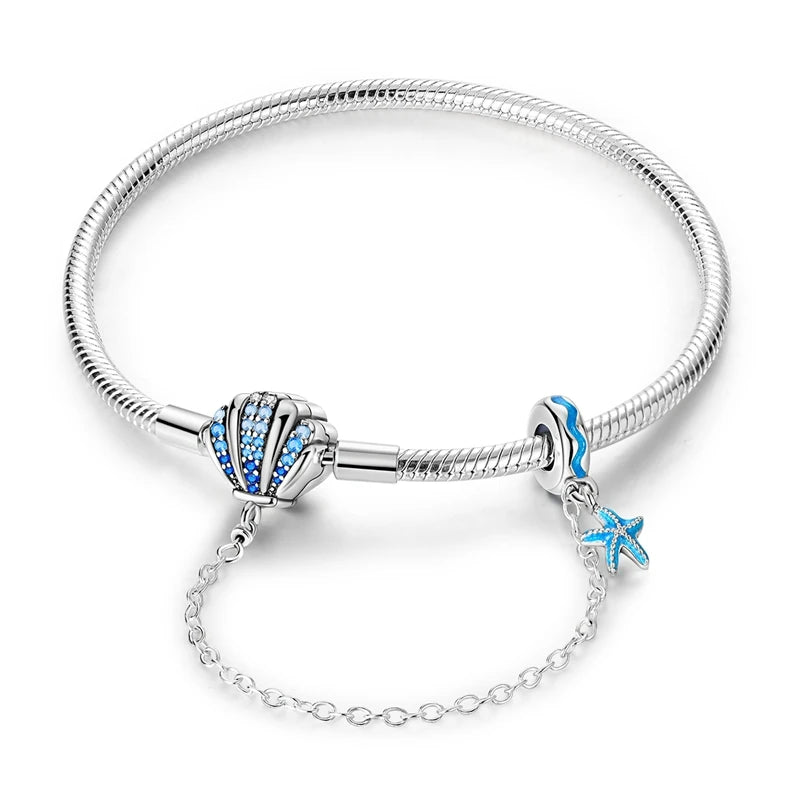 Coastal Sterling Silver Charm Bracelet With Sparkling Seashell - Bracelets