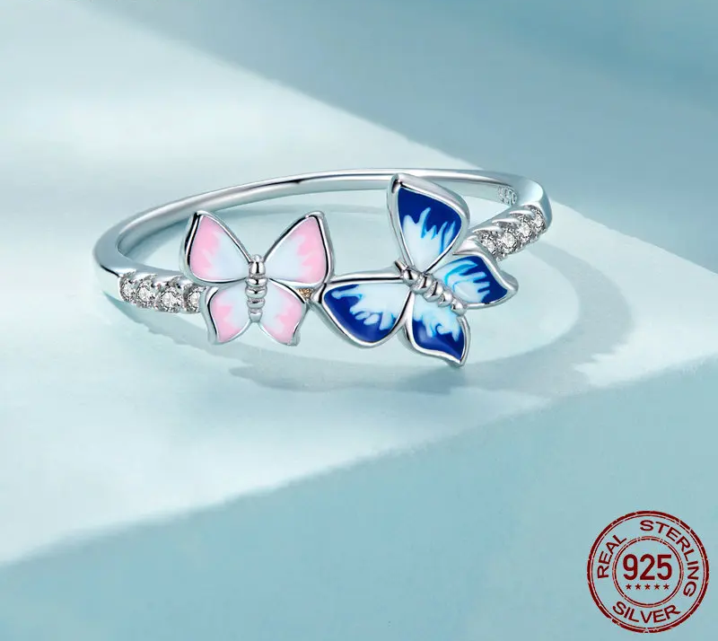 Flutter of Elegance: Sterling Silver CZ Butterfly Band Ring - Rings