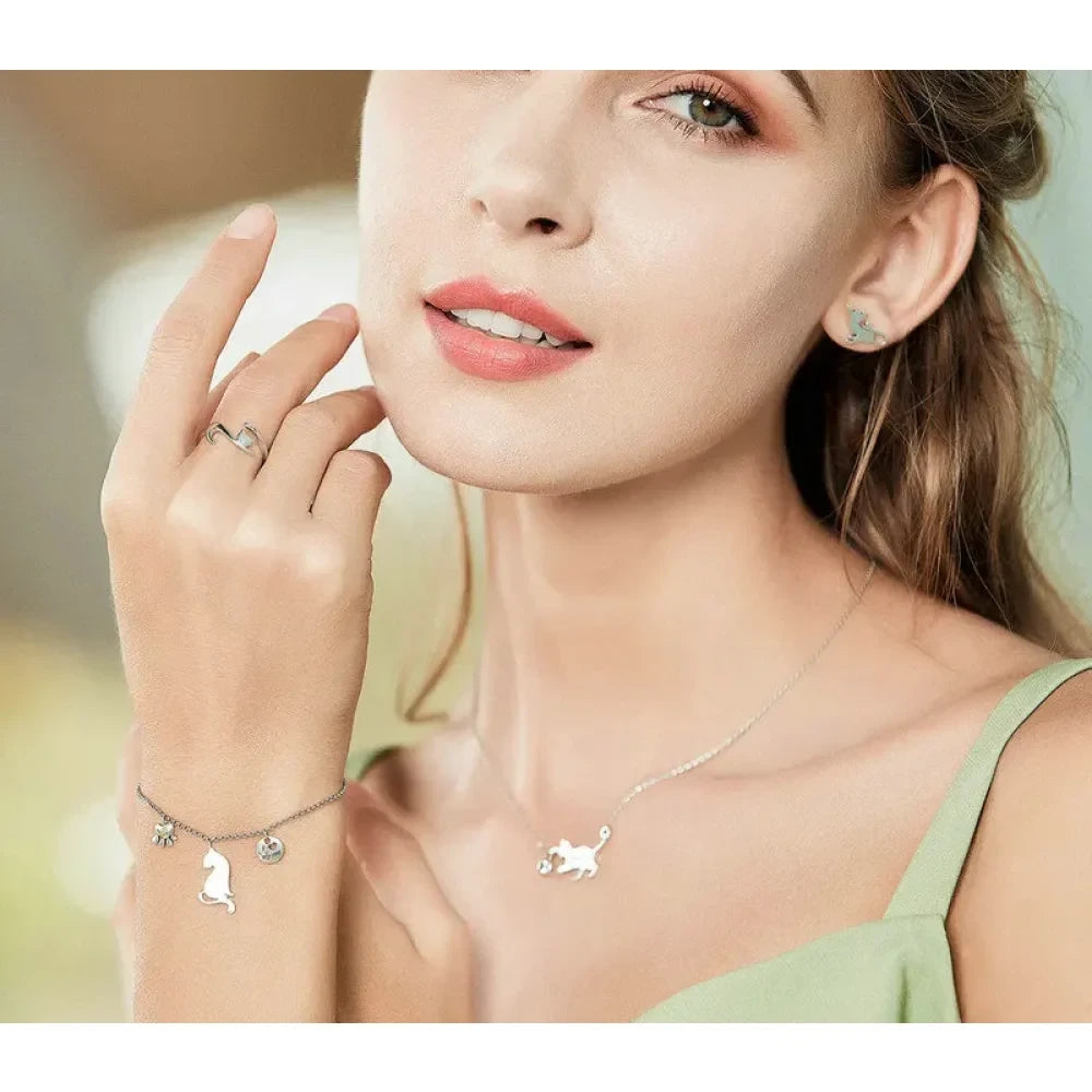 Playful Feline: Adjustable Sterling Silver Cat Ring with Long Tail - Rings