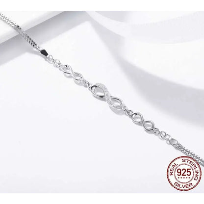 Timeless Infinity - Sterling Silver Bracelet with Sparkling Zirconia - Bracelets