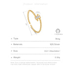 twisted Gold ring with measurement details on a white background